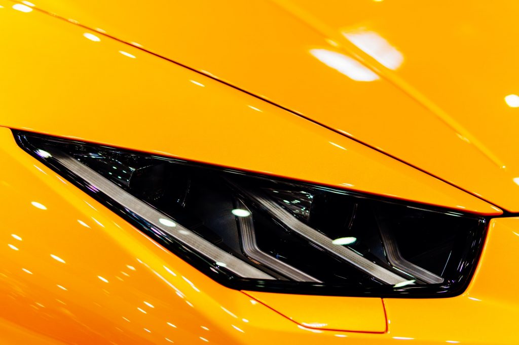 Head Lights Of Luxurious Yellow Sports Car